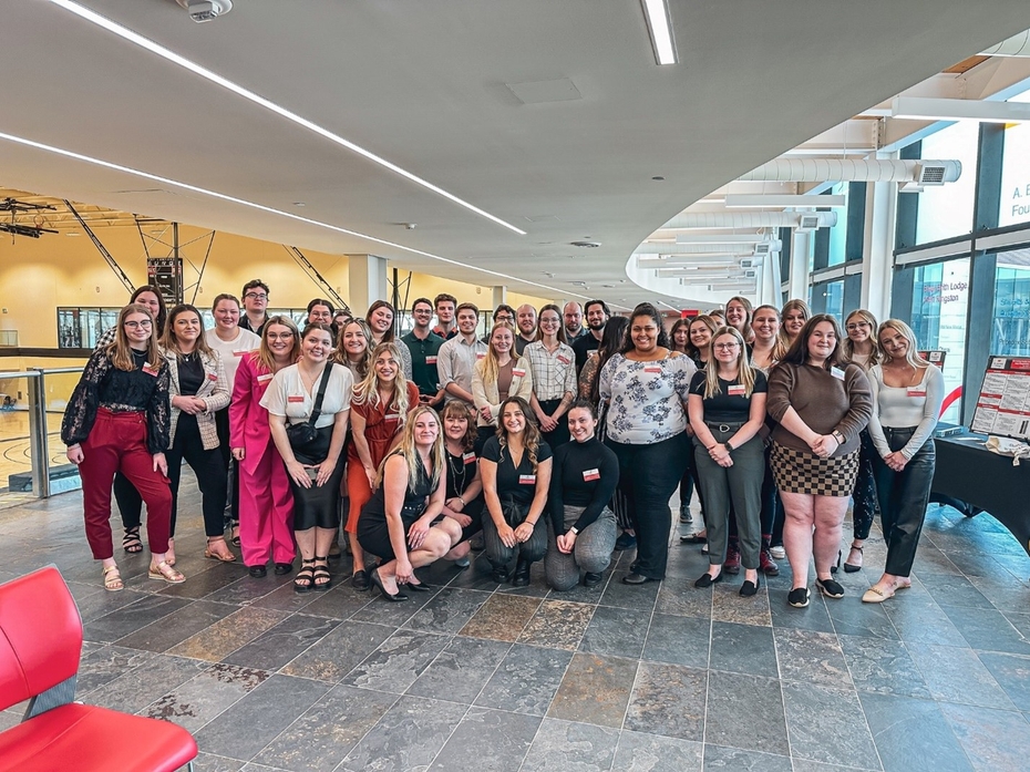 A group photo of fourth-year Honours Bachelor of Behavioural Psychology Students in the upper concourse of SLC